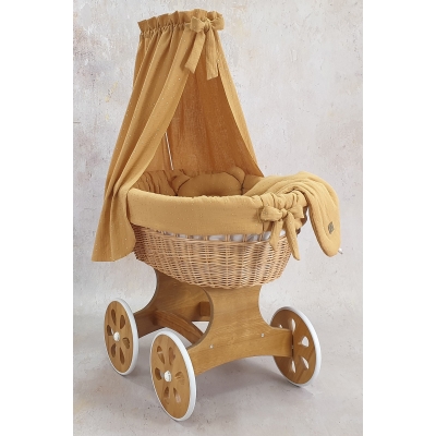 Piccolo lettino con velo ruote grandi Piccolo lettino con velo ruote grandi